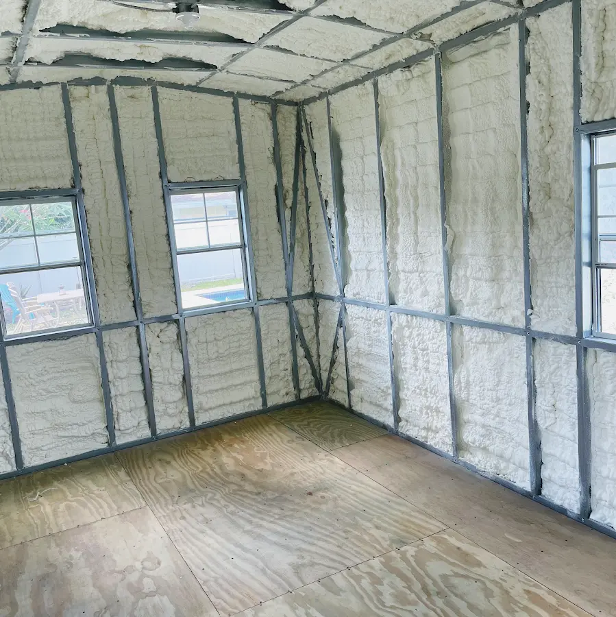 Closed-cell spray foam insulation applied to wall cavities in a residential project in Spring Lake Park